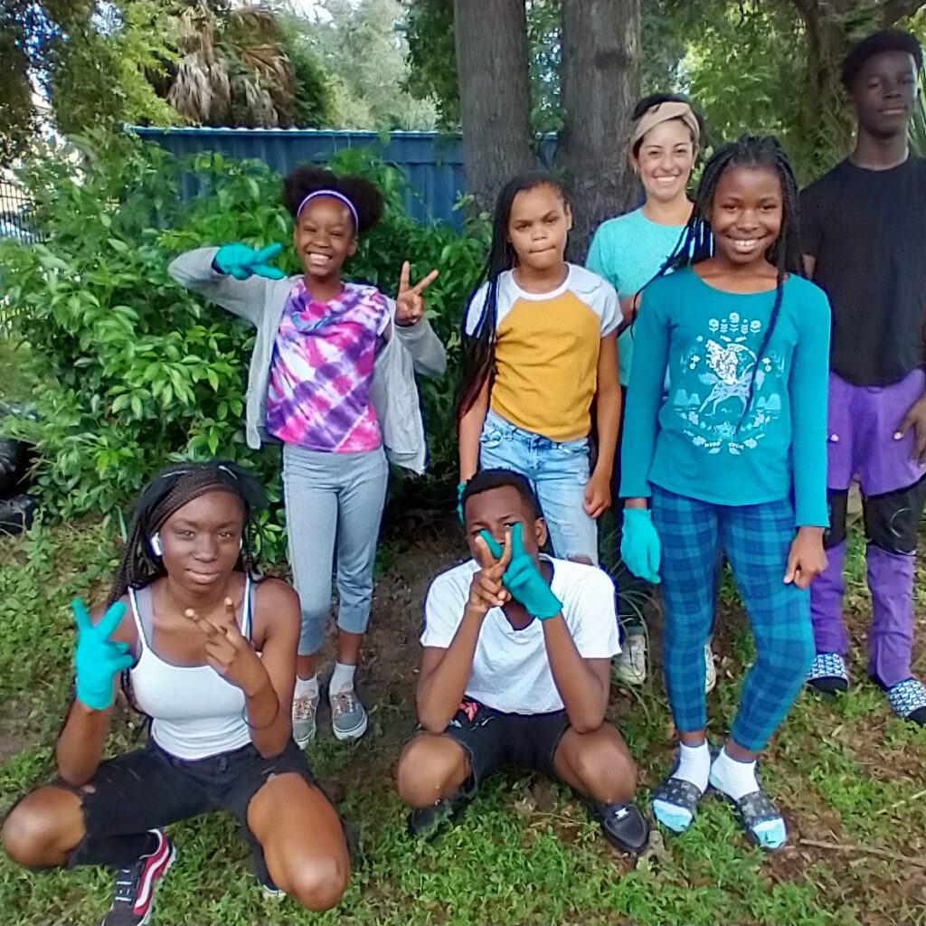 Kids participating in beautification project at Tampa Heights Junior Civic Association