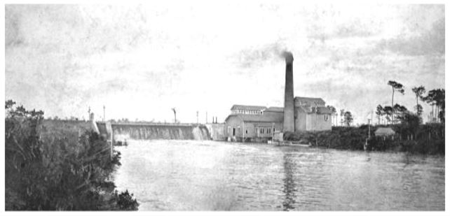old black and white photo of hillsborough river dam